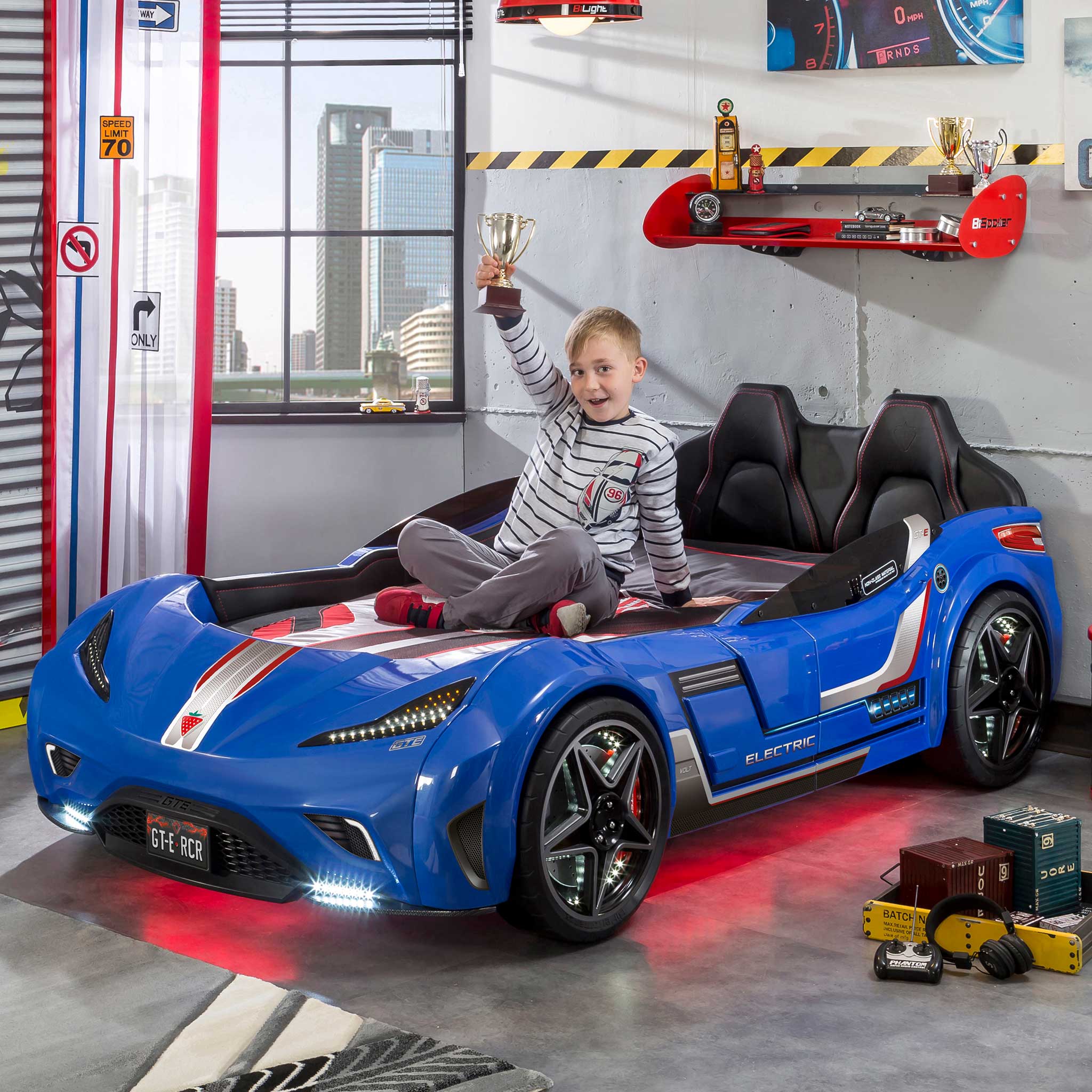 GTS EV Blue Twin-Size Race Car Bed, Remote Control with 4 Modes, LED Lights, Sound FX, Upholstered Headboard, Interior Padding